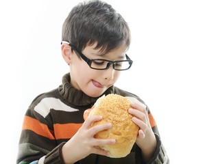 Kid eating bread bun