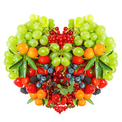 heart shaped mix of fruits and berries on white
