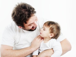 Happy father holding a smiling cute baby
