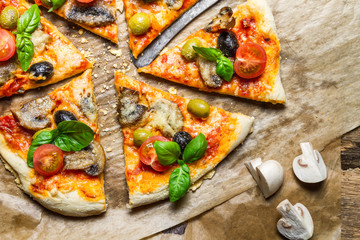 Close-up on a freshly split a pizza