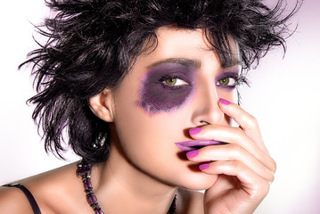 Beautiful Brunette with creative makeup. Eyeshadow