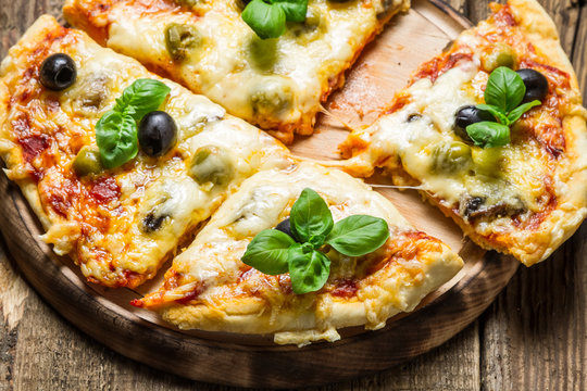 Closeup of freshly baked pizza with cheese