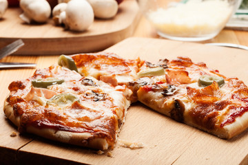 Pizza with cheese, ham and mushroom