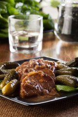 Pork loin with mushroom sauce. Dark light