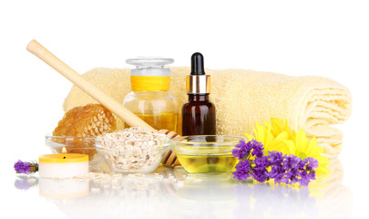 Fragrant honey spa with oils and honey isolated on white