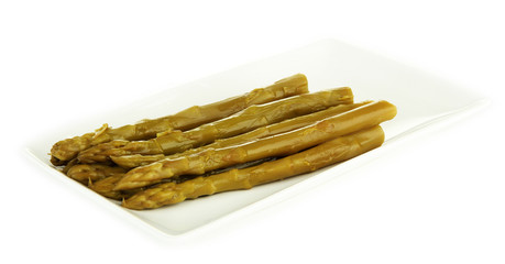 Asparagus on plate, isolated on white