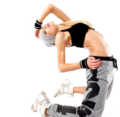 young and beautiful dancer posing in studio