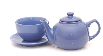 Tea cup with teapot isolated on white