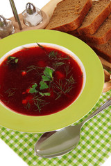 Delicious borsch on table close-up