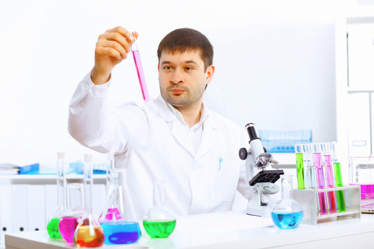 Young male scientist working in laboratory