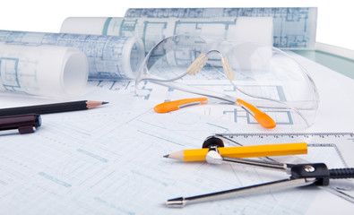 safety glasses and writing equipment of architect
