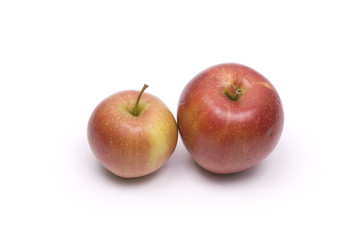 Two red apples isolated on white