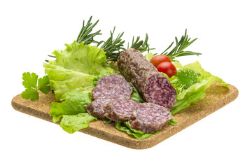 Salami with rosemary, salad and tomatoes