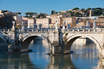 Obraz premium St Angel bridge on Tiber river in Rome