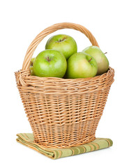 Fresh ripe green apples in basket