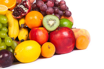 Huge group of fresh fruits isolated on a white background.