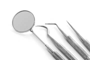 Basic dentist tools isolated on white