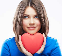 Smiling young woman hold red heart, Valentine day symbol. Girl