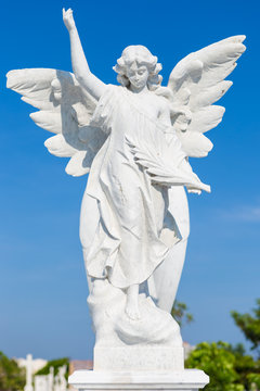 White marble statue of a young female angel