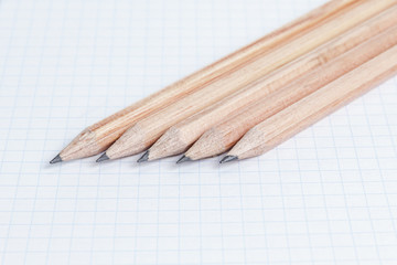 pencils on notebook page