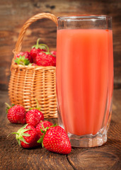 fresh strawberries and a glass of juice