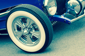 retro toned luxury vintage auto with white-wall wheels