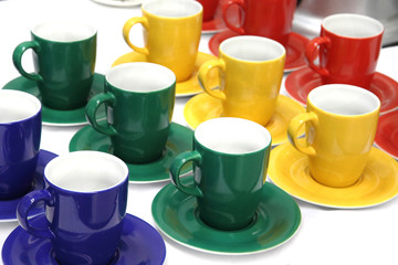 color cups in green, red, blue and yellow colors