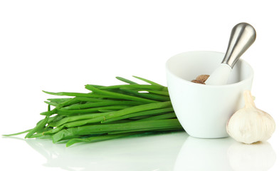 Mortar, herbs and garlic, isolated on white