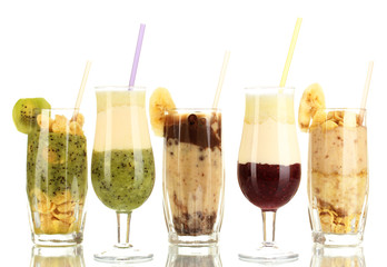 Delicious fruit smoothies isolated on white