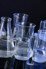 Test tubes on black background