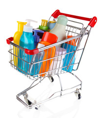 Cosmetics in cart isolated on white