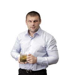 A man with a glass of tea