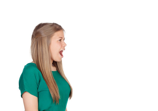 Beautiful young girl with green t-shirt screaming out loud