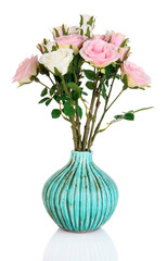 Beautiful pink and white roses in vase isolated on white