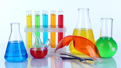 Test-tubes with colorful liquids isolated on white