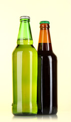 Bottles of beer on light background