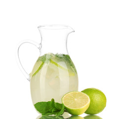 Lemonade in pitcher isolated on white