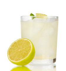 Lemonade in glass isolated on white