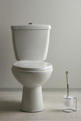 White toilet bowl in a bathroom