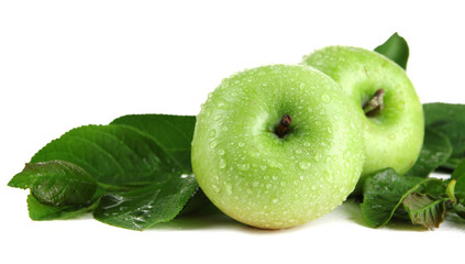 Juicy green apples with leaves, isolated on white