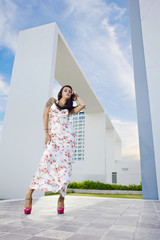 Fashion model in white dress