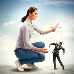 Businesswoman puppeteer