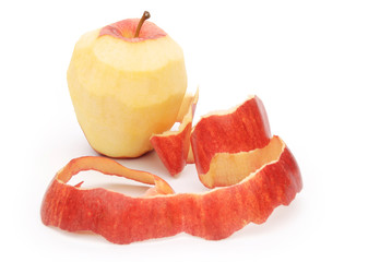 apple with peeled skin on white background