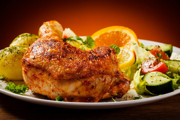 Grilled chicken leg with vegetables