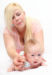 Young mother with her baby together.