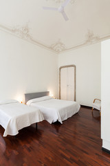 Fototapeta na wymiar beautiful hotel room in a historic building, double room