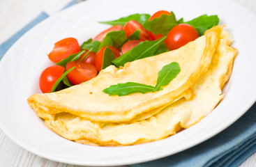Omelet with vegetable salad