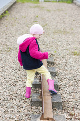 little girl at out of action track on Laigh Milton Viaduct, East