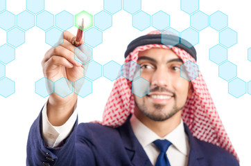 Arab man pressing virtual buttons