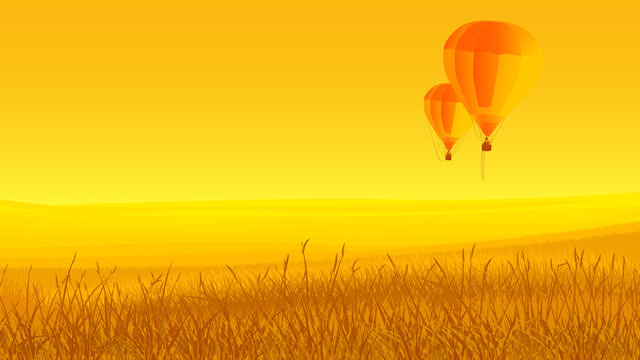 Two air balloons, ground and sunset.